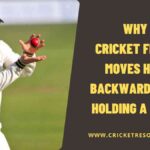 Why a Cricket Fielder Moves Hands Backwards While Holding a Catch?